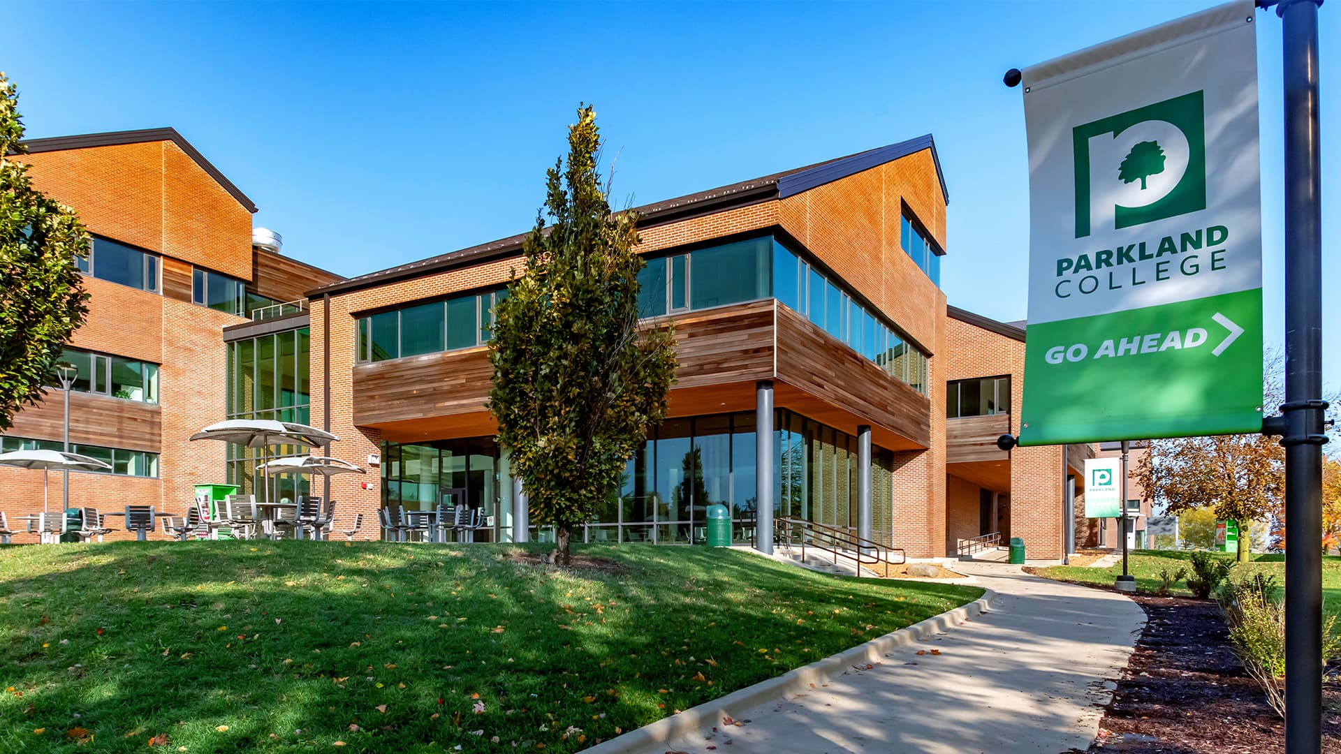 exterior of college with trees